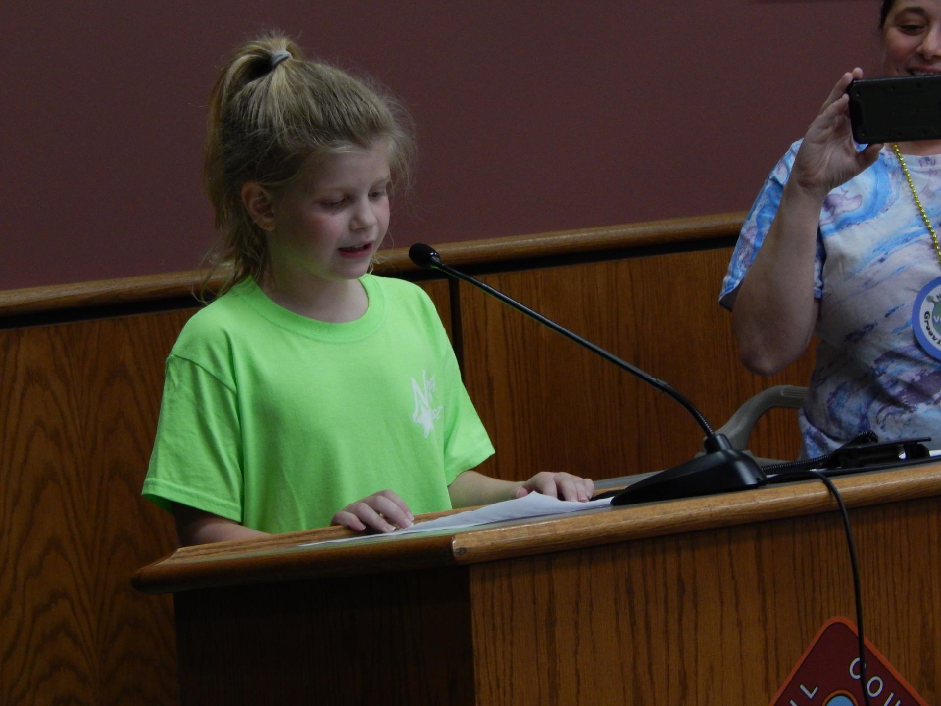 North East Elementary School student accepts Green School status certificate